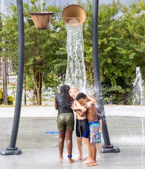 kids playing in splash pad