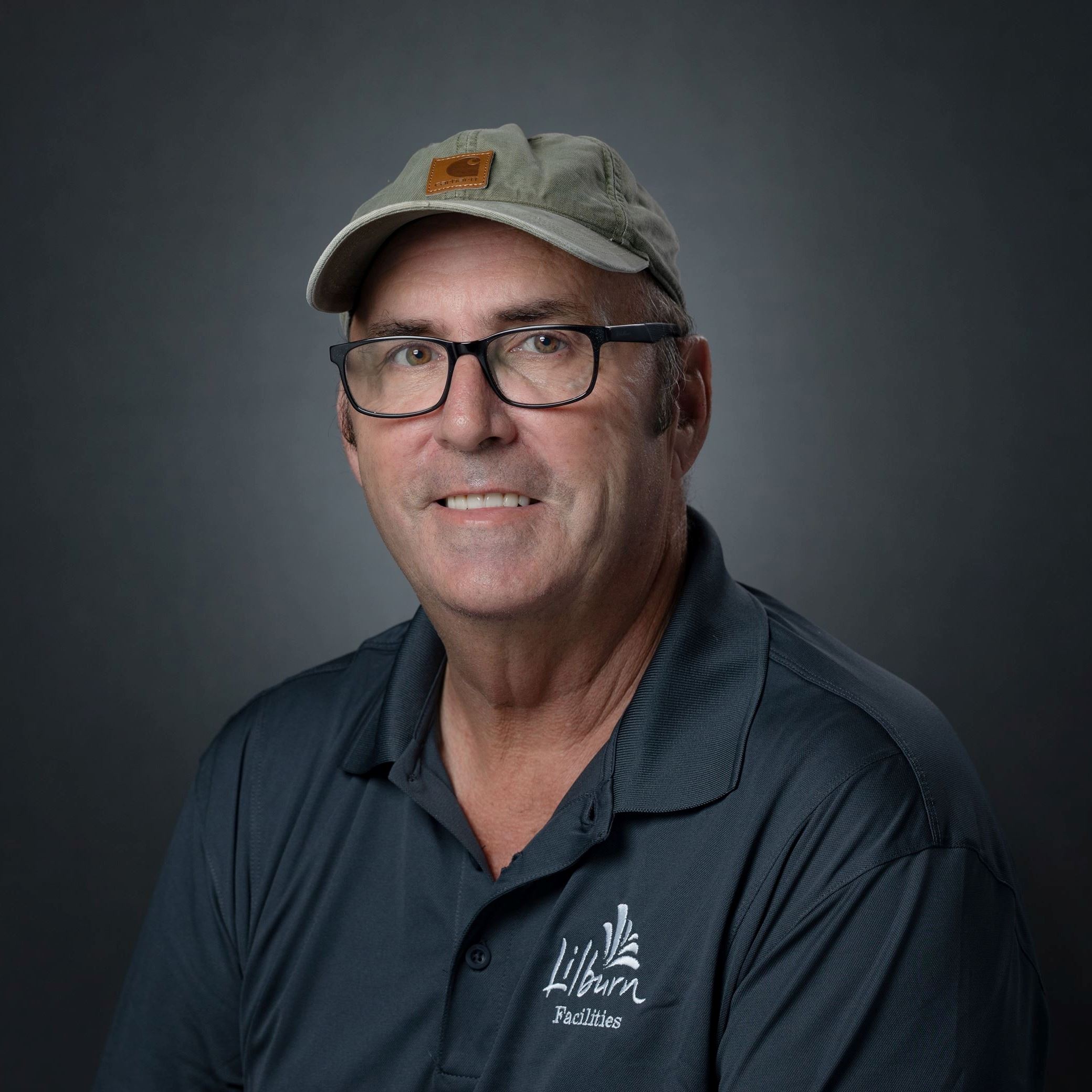 Headshot of Barry Lamon - Male wearing hat and gray shirt